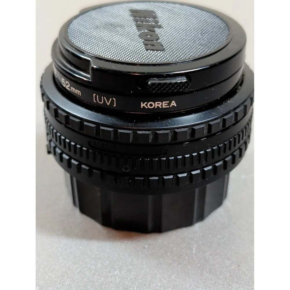 Nikon Series E 50mm f/1.8 Manual Focus Pancake Lens with Kalimar UV Filter Pouch